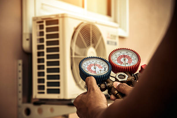 Professional Air Conditioning Service technician working in Tavernier, FL